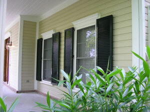 Traditional louvered shutters accenting a southern home for added depth and architectural appeal.